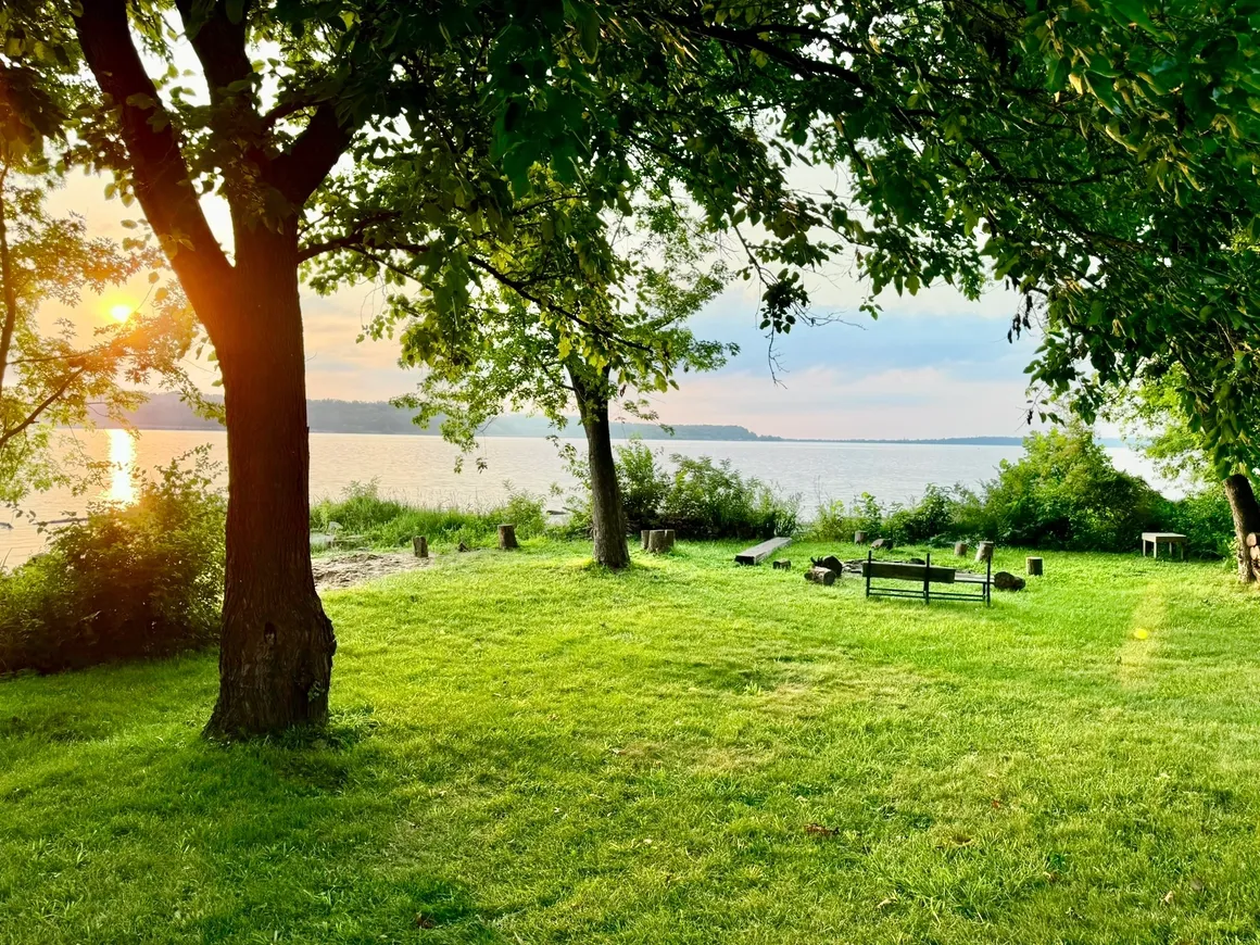 Riverfront:  grassy area, sandy area, fire pit